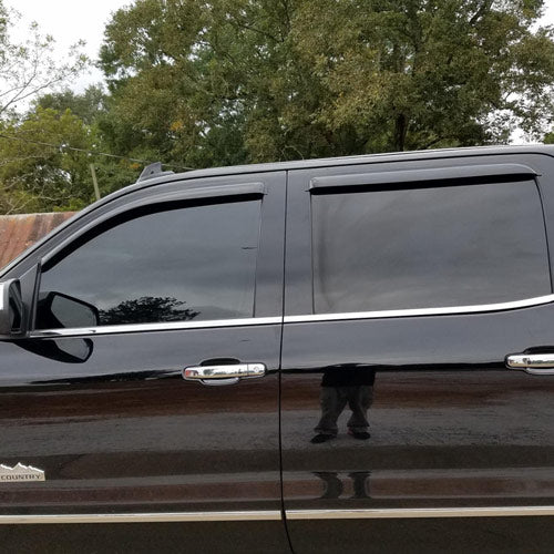 Dark window tint on black truck