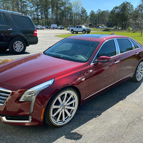 Red Cadillac showing off new window tint