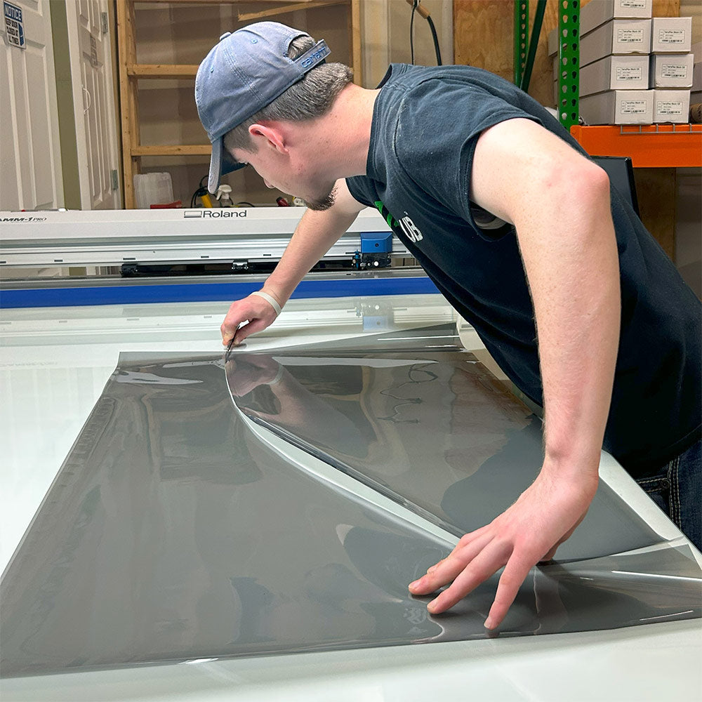 Cutting out window tint pattern before installation